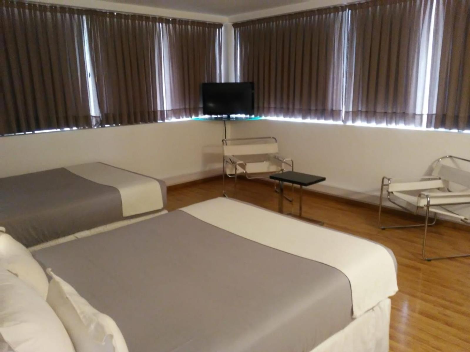 Global Hotel Centenario Buitenkant foto